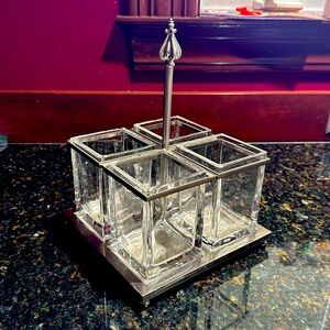 Silverware caddy of metal and glass. Perfect for hosting parties and dinners.